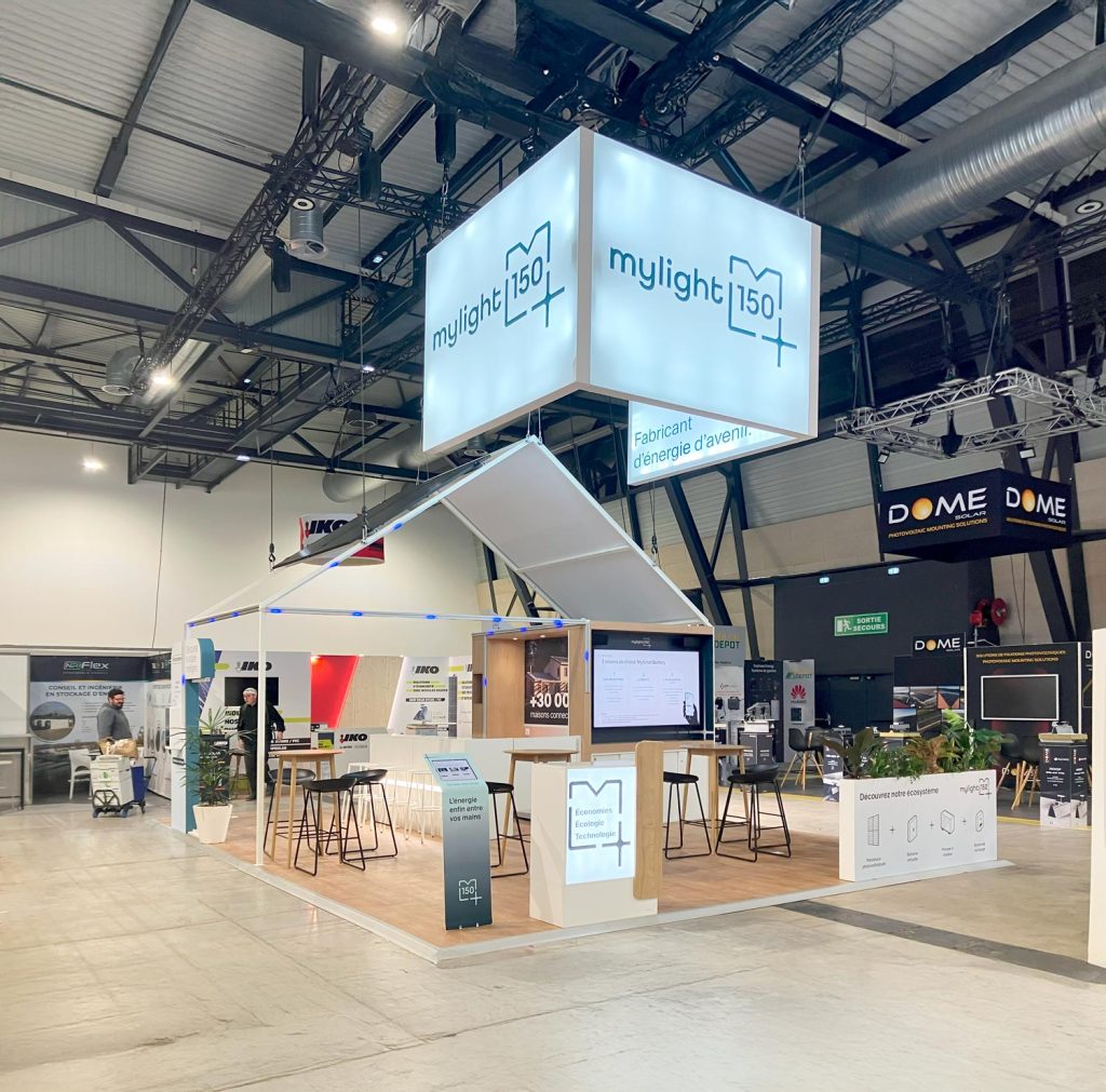 l'image montre un stand sur mesure réalisé pour un salon professionnel. il illustre la page salon dédiée à BE positive